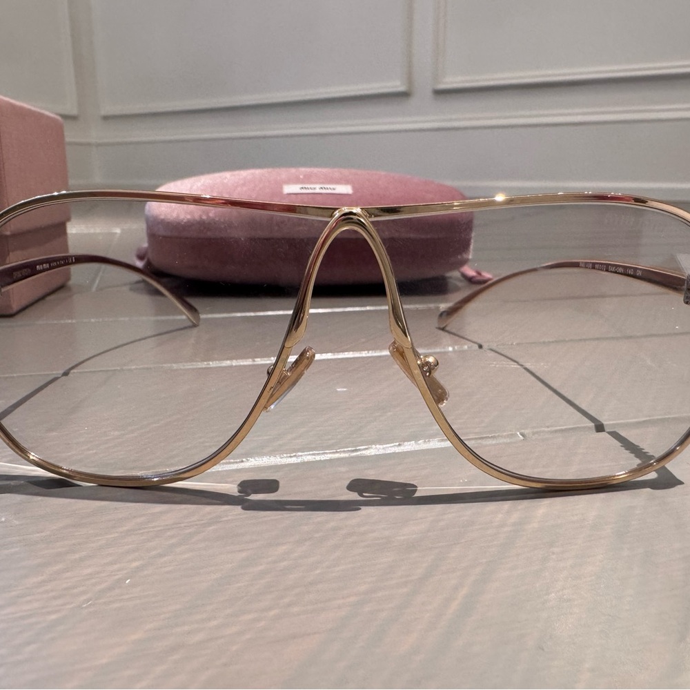Miu Miu Gold Frame Glasses